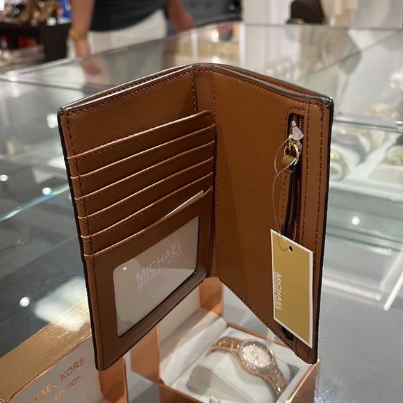 Michael Kors Jet Set Travel Passport Wallet
Brown Signature/Golden-Tone Hardware - Picture 11 of 16